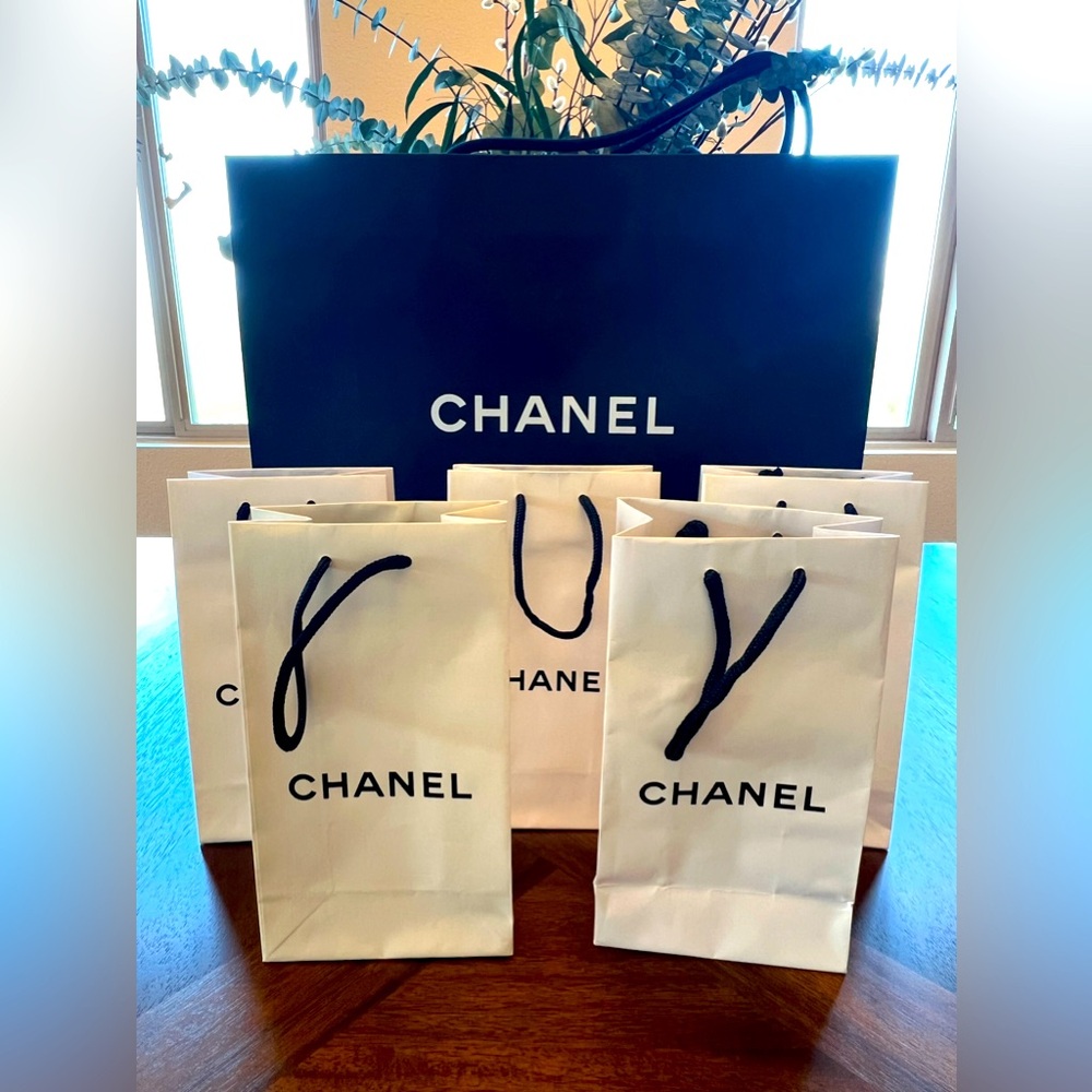 Chanel - set of 5 white shopping bags